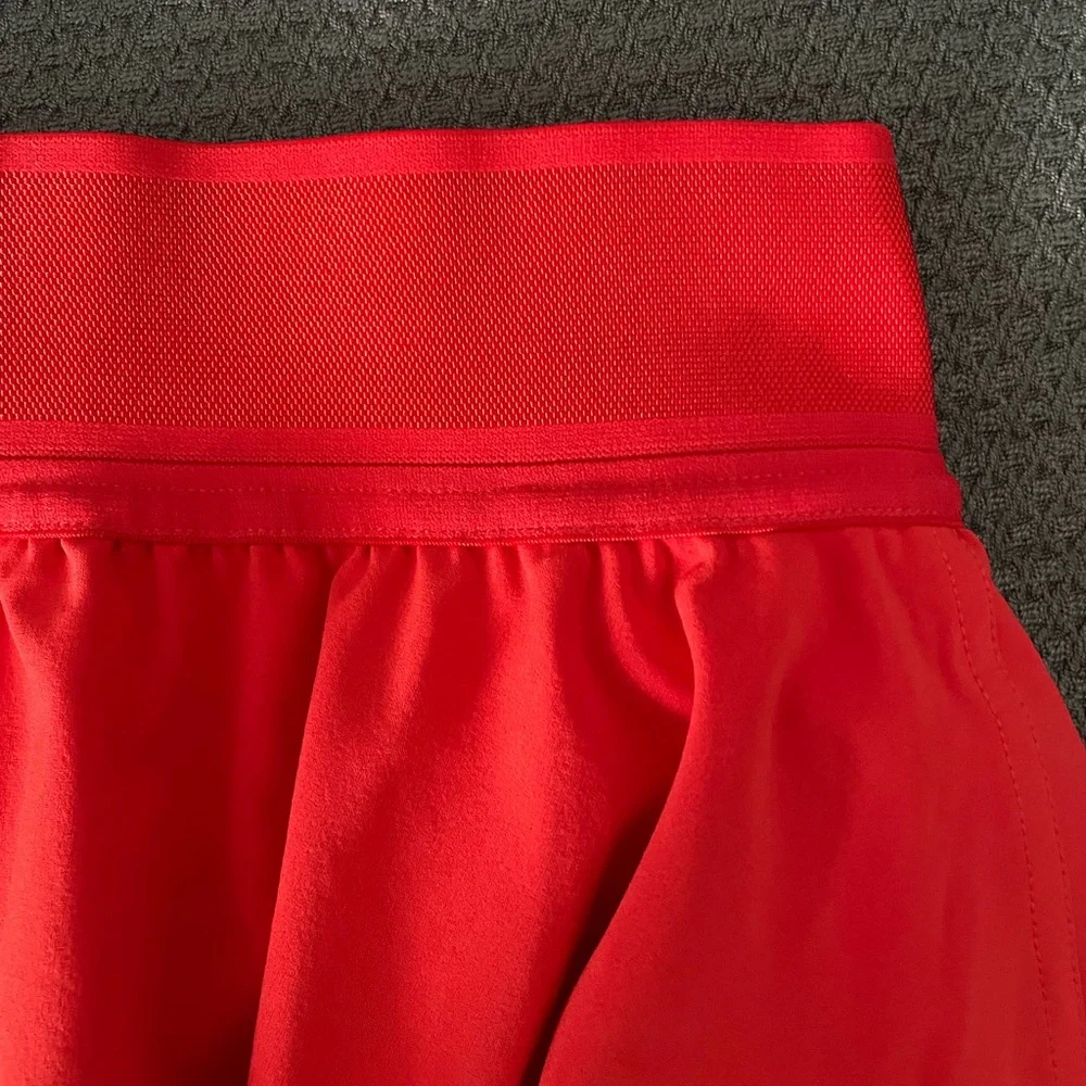 Lululemon Court Rival 14” Skirt in a vibrant Coral color - Picture 10 of 12